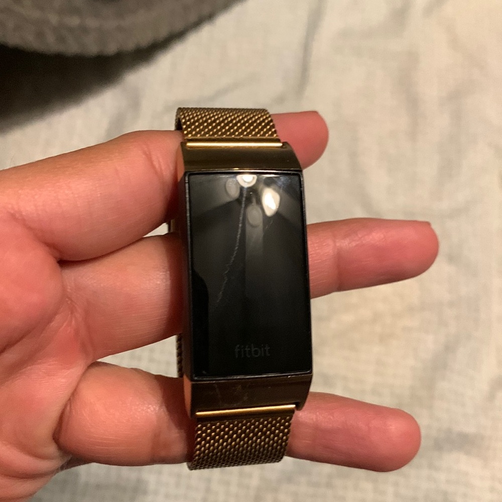 Fitbit charge 4 with gold metallic band